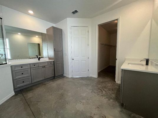 Bathroom, Dual Sink Vanities, Interior, Recessed Lighting, Walk-in Closets
