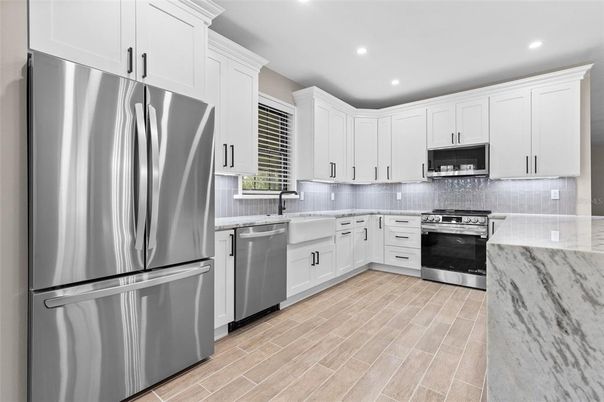 Interior, Kitchen, Recessed Lighting, Stainless Steel Appliances, Wood Texture Flooring