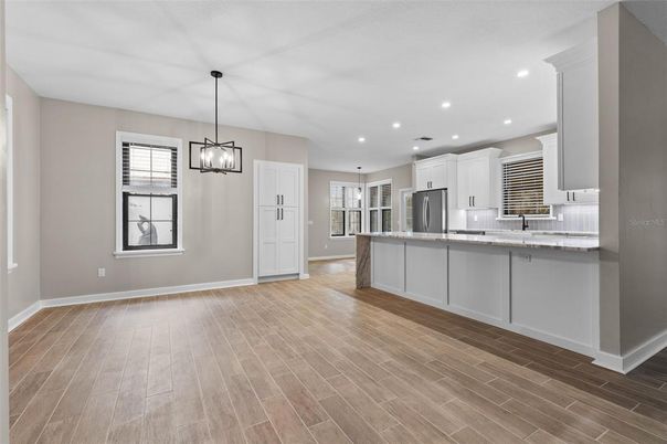 Interior, Kitchen, Pendant Lights, Recessed Lighting, Stainless Steel Appliances, Wood Texture Flooring