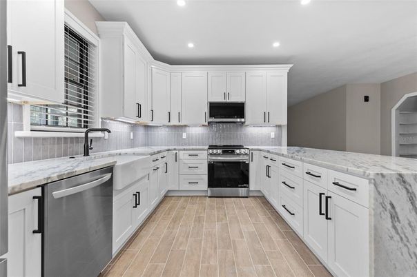 Interior, Kitchen, Recessed Lighting, Stainless Steel Appliances, Wood Texture Flooring