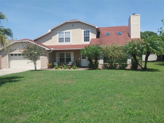 Attached, Backyard, Exterior, Facade, Brick Facade, Ranch