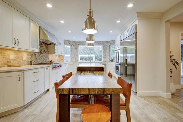 Dining room, Interior, Kitchen, Pendant Lights, Recessed Lighting, Stainless Steel Appliances, Wood Texture Flooring