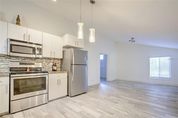 Interior, Kitchen, Pendant Lights, Stainless Steel Appliances, Wood Texture Flooring