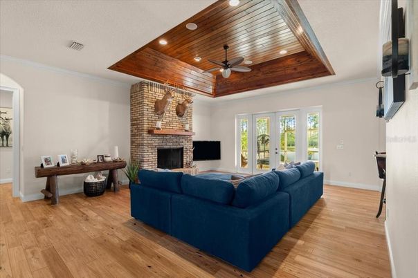 Fireplace, Interior, Living room, Recessed Lighting, Stone Walls, Wooden Ceilings, Wood Texture Flooring