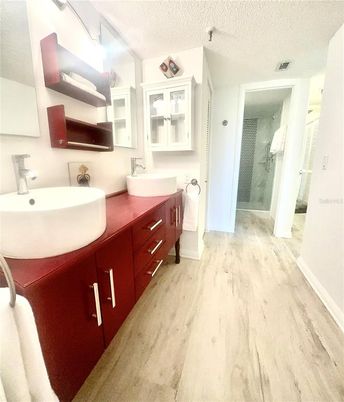 Bathroom, Dual Sink Vanities, Glass Shower, Interior, Wood Texture Flooring