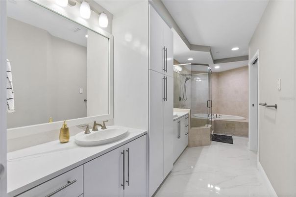 Bathroom, Dual Sink Vanities, Glass Shower, Interior, Marble, Recessed Lighting