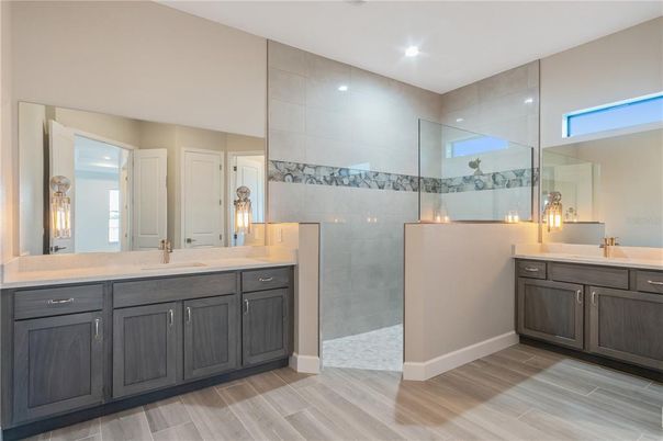 Bathroom, Dual Sink Vanities, Glass Shower, Interior, Recessed Lighting, Wood Texture Flooring