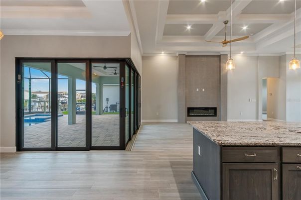 Fireplace, Interior, Pendant Lights, Recessed Lighting, Wood Texture Flooring
