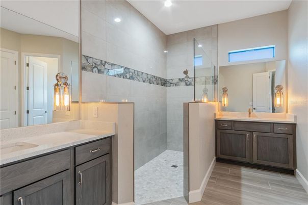 Bathroom, Dual Sink Vanities, Glass Shower, Interior, Recessed Lighting, Wood Texture Flooring