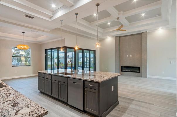 Fireplace, Interior, Kitchen, Pendant Lights, Recessed Lighting, Wood Texture Flooring