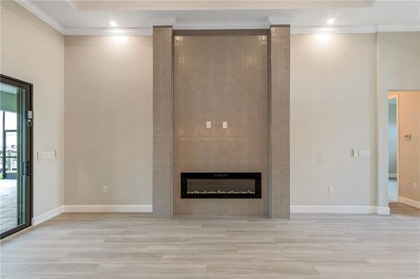 Empty room, Fireplace, Interior, Recessed Lighting, Wood Texture Flooring