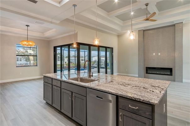 Fireplace, Interior, Kitchen, Pendant Lights, Recessed Lighting, Wood Texture Flooring