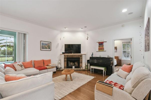Fireplace, Interior, Living room, Piano, Recessed Lighting, Wood Texture Flooring