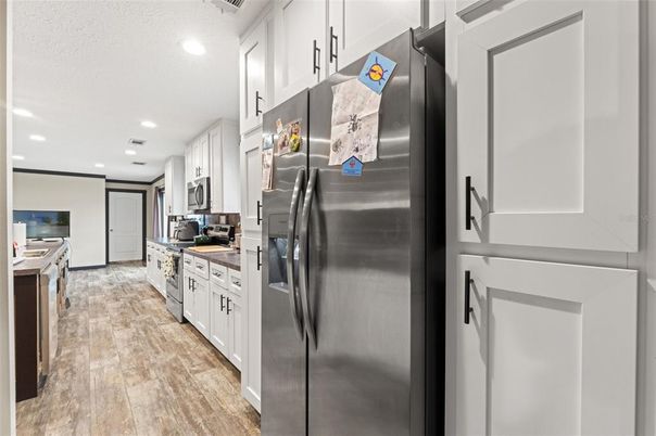 Interior, Kitchen, Recessed Lighting, Stainless Steel Appliances, Wood Texture Flooring