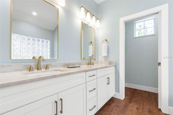 Bathroom, Dual Sink Vanities, Interior, Recessed Lighting, Wood Texture Flooring