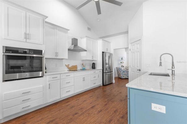 Interior, Kitchen, Recessed Lighting, Stainless Steel Appliances, Wood Texture Flooring