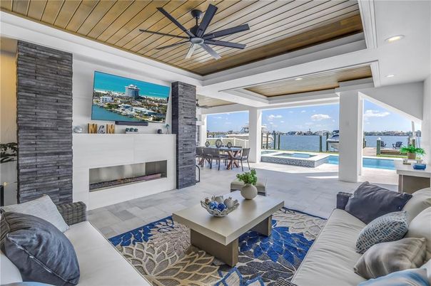Dining room, Fireplace, Interior, Living room, Recessed Lighting, Water, Wooden Ceilings