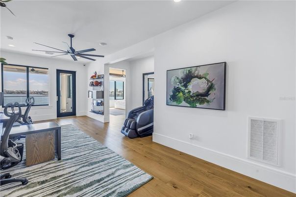 Fireplace, Fitness Equipment, Interior, Recessed Lighting, Wood Texture Flooring