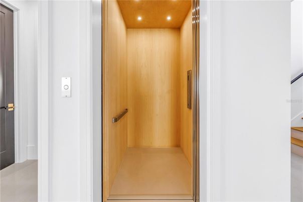 Elevator, Interior, Recessed Lighting, Wooden Ceilings, Wooden Walls
