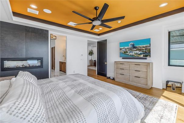 Bedroom, Fireplace, Interior, Recessed Lighting, Wood Texture Flooring