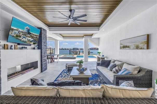 Fireplace, Interior, Living room, Recessed Lighting, Water, Wooden Ceilings