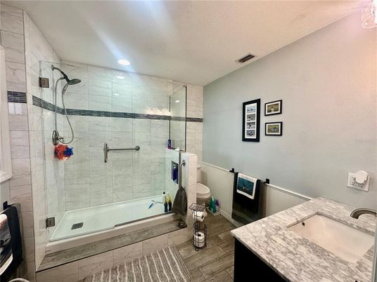 Bathroom, Glass Shower, Interior, Recessed Lighting, Wood Texture Flooring