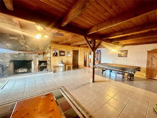 Billiard Table, Fireplace, Game Room, Interior, Stone Walls, Wooden Beams, Wooden Ceilings