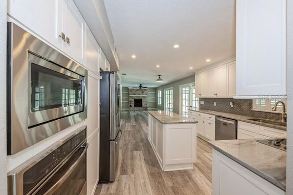 Interior, Kitchen, Recessed Lighting, Stainless Steel Appliances, Wood Texture Flooring
