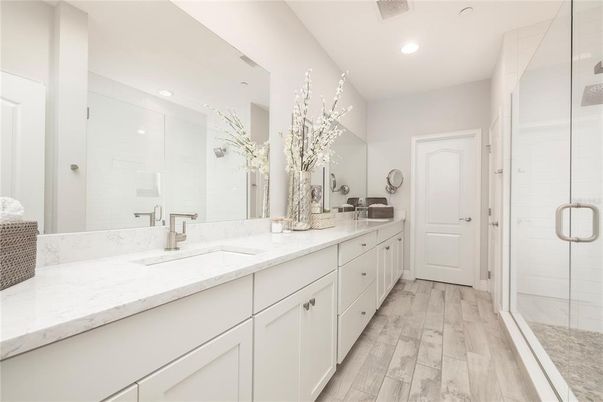 Bathroom, Dual Sink Vanities, Glass Shower, Interior, Recessed Lighting, Wood Texture Flooring