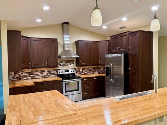 Interior, Kitchen, Pendant Lights, Recessed Lighting, Stainless Steel Appliances, Wood Texture Flooring
