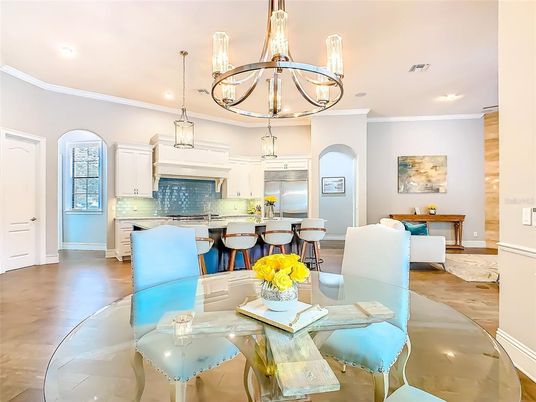 Chandelier, Dining room, Interior, Kitchen, Pendant Lights, Recessed Lighting, Stainless Steel Appliances