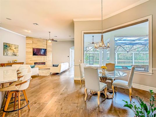 Dining room, Fireplace, Glass Ceilings, Interior, Living room, Pendant Lights, Sun Room, Wood Texture Flooring