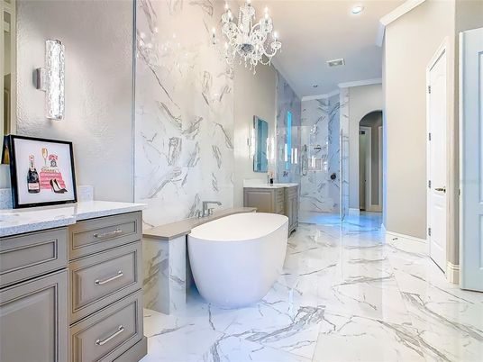 Bathroom, Chandelier, Free Standing Baths, Glass Shower, Interior, Marble, Marble Walls, Recessed Lighting