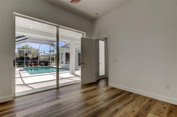 Interior, Pool, Recessed Lighting, Sun Room, Wood Texture Flooring