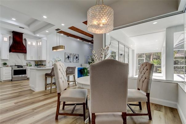 Dining room, Interior, Kitchen, Pendant Lights, Recessed Lighting, Stainless Steel Appliances, Wood Texture Flooring