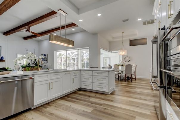 Dining room, Interior, Kitchen, Pendant Lights, Recessed Lighting, Stainless Steel Appliances, Wooden Beams, Wood Texture Flooring