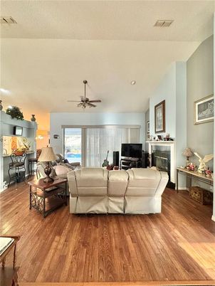Fireplace, Interior, Living room, Recessed Lighting, Wood Texture Flooring