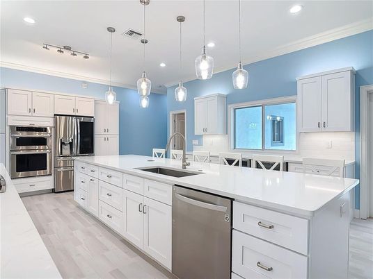 Interior, Kitchen, Pendant Lights, Recessed Lighting, Stainless Steel Appliances, Wood Texture Flooring
