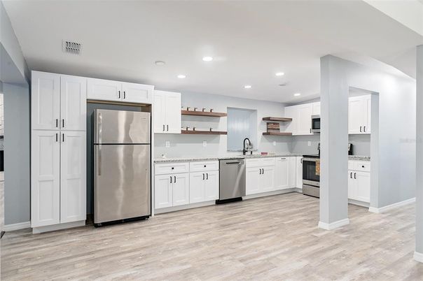 Interior, Kitchen, Recessed Lighting, Stainless Steel Appliances, Wood Texture Flooring