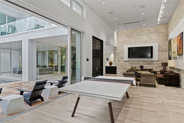 Game Room, Interior, Living room, Recessed Lighting, Stone Walls, Wood Texture Flooring