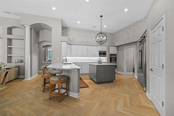 Chandelier, Interior, Kitchen, Recessed Lighting, Stainless Steel Appliances, Wood Texture Flooring