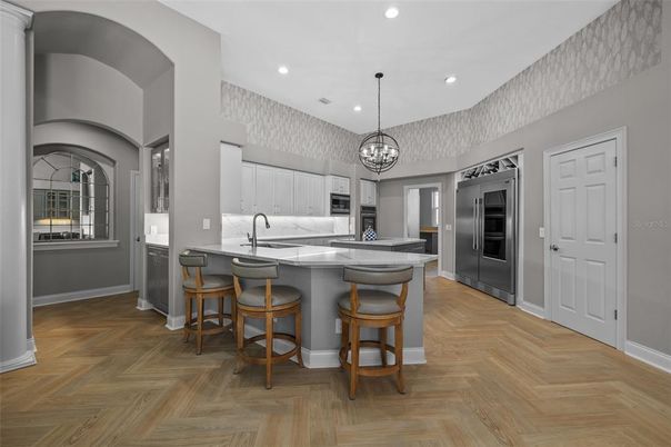Chandelier, Interior, Kitchen, Pendant Lights, Recessed Lighting, Stainless Steel Appliances, Wood Texture Flooring