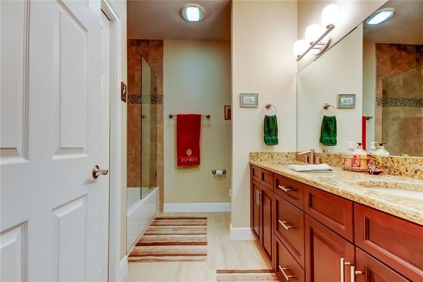 Bathroom, Dual Sink Vanities, Glass Shower, Interior, Wood Texture Flooring