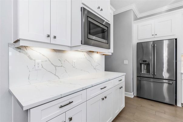 Interior, Kitchen, Marble Walls, Stainless Steel Appliances, Wood Texture Flooring