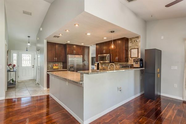 Interior, Kitchen, Pendant Lights, Recessed Lighting, Stainless Steel Appliances, Wood Texture Flooring