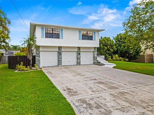 Attached, Exterior, Facade, Raised Ranch