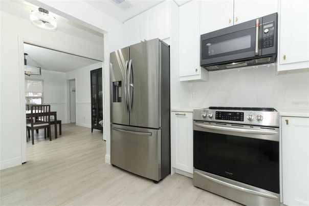 Dining room, Interior, Kitchen, Stainless Steel Appliances, Wood Texture Flooring