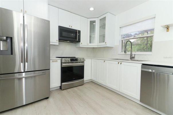 Interior, Kitchen, Recessed Lighting, Stainless Steel Appliances, Wood Texture Flooring