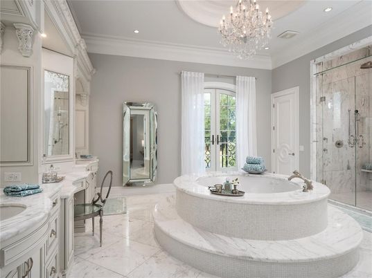 Bathroom, Chandelier, Dual Sink Vanities, Glass Shower, Interior, Marble, Marble Walls, Recessed Lighting