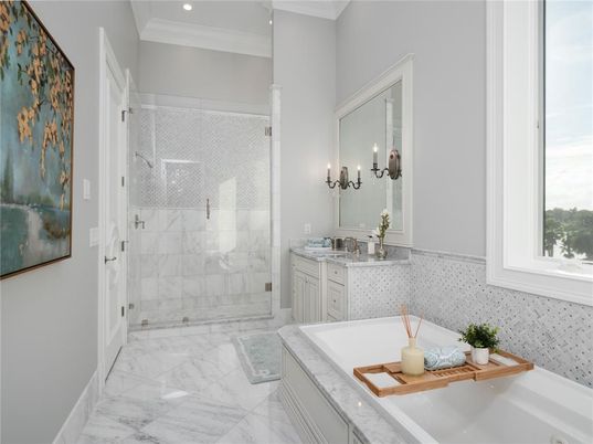 Bathroom, Dual Sink Vanities, Glass Shower, Interior, Marble, Marble Walls, Recessed Lighting